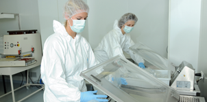 DOT employees packing in the clean room